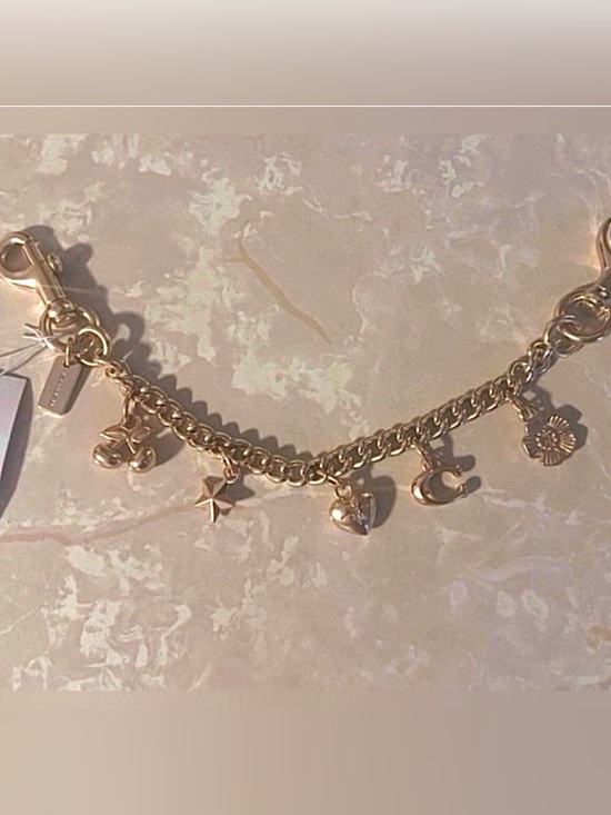 Coach Accessories - Coach Gold Charm Strap with Charms (11inches)